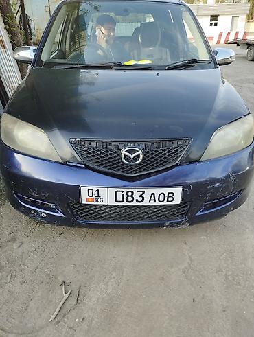 250: Mazda Demio: 2005 г., 1.3 л, Автомат, Бензин, Универсал — 1