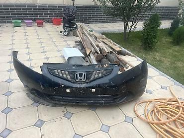 Передний бампер Honda (с эмблемой на решётке). - Оригинальная деталь