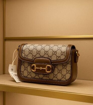 pencekler qadin ucun: Çiyin çantası, Gucci