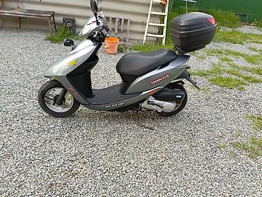 devo tiko: Скутер Honda (серия Dio) в серебристом цвете. Характеристики и — 6