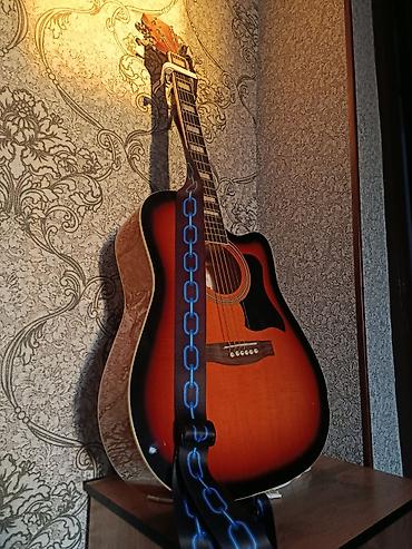 Акустическая гитара с вырезом (дредноут, cutaway), окраска sunburst