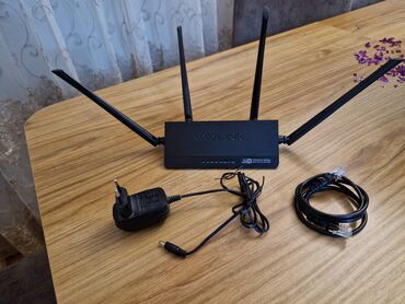 modem router wifi: Wavlink router .hem router hemde repeater rolunu oynayir yeni zeif