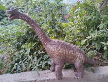 игрушка чемодан: Динозавр резиновый