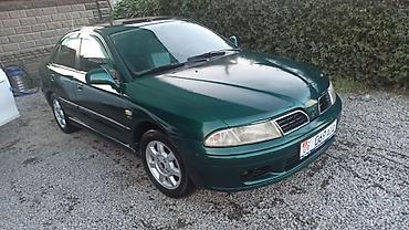 купить мазерати: Mitsubishi Carisma: 1999 г., Бензин, Седан — 1