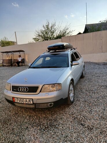 антена на авто: Серебристый универсал Audi A6 с багажником на крыше. Автомобиль
