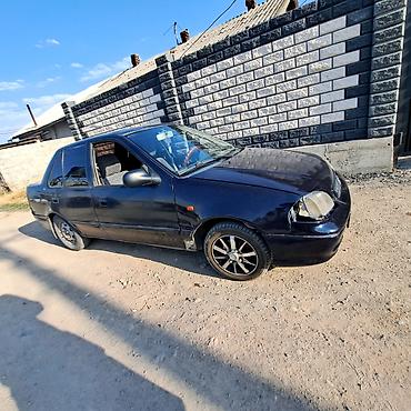 Suzuki Swift: 2002 г., 1.3 л, Автомат, Бензин