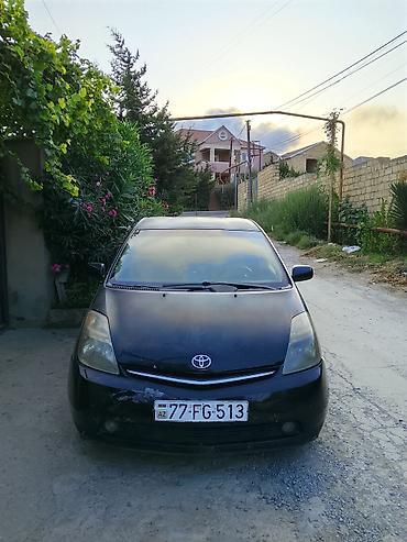 prius diskləri: Toyota Prius, 2-ci nəsil, hibrid. - Kuzov: hetçbek, qara rəng - Güc — 3