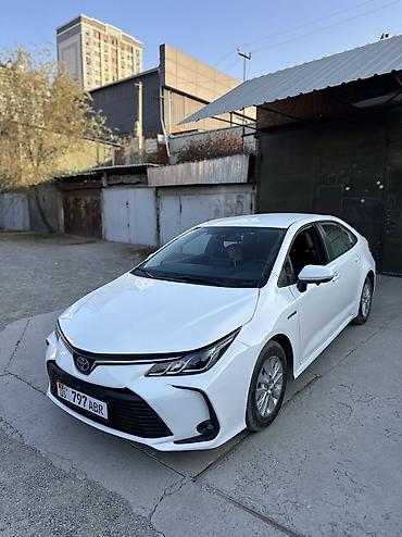 Toyota Corolla: 2022 г., 1.8 л, Автомат, Гибрид, Седан at lalafo.kg Toyota Corolla: 2022 г., 1.8 л, Автомат, Гибрид, Седан