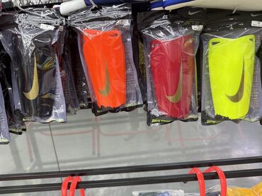 спорт маска: Футбольные щитки Nike (Shin Guard) - Назначение: защита голени при