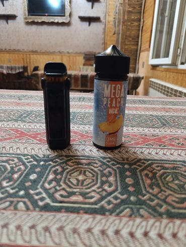 Qəlyan, vayp və aksesuarları: Vape cihazı və maye seti - Pod mod tipli elektron siqaret. Korpusda