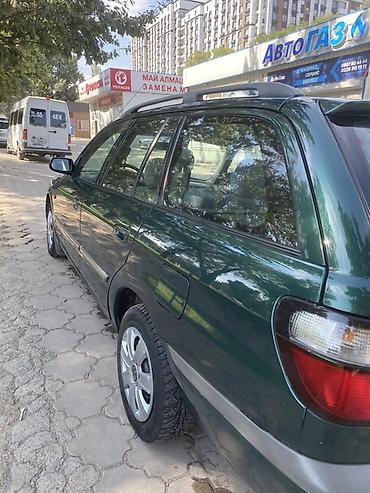 х2 00: Mazda Capella: 2000 г., 2 л, Механика, Бензин, Универсал — 5