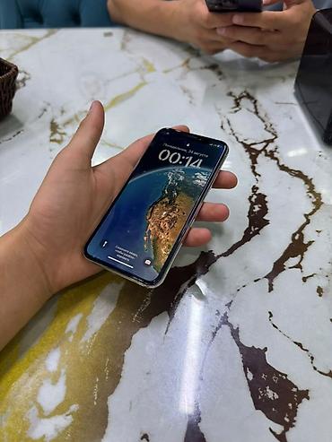 apple m4: IPhone X, 64 ГБ, серебристый - Экран OLED Super Retina с вырезом под — 1