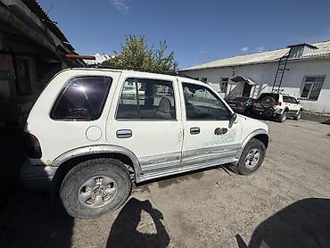 танден: Kia Sportage: 1995 г., 2 л, Механика, Дизель, Внедорожник — 2