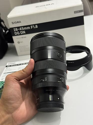 Фото и видеокамеры: Продаю Sigma 28-45mm f1.8 Sony E mount, полный кадр Покупал 7го — 6