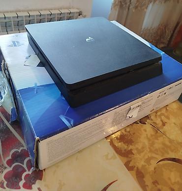 ps4 slim 2 tb: Sony PlayStation 4 Slim oyun konsolu Xüsusiyyətlər: - Rəng: qara - — 1