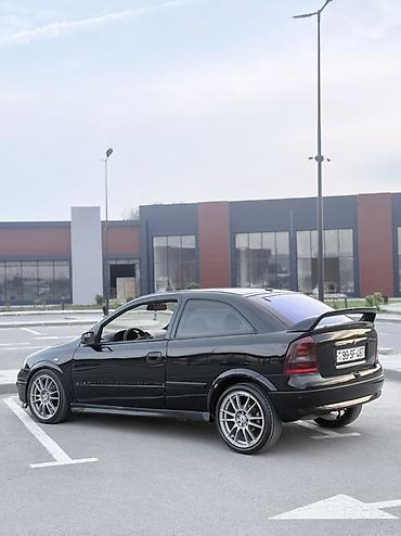 Opel: Model: Opel Astra G Coupe (3 qapı) Rəng: qara Kuzov: hetçbek/kupeli 3 — 2