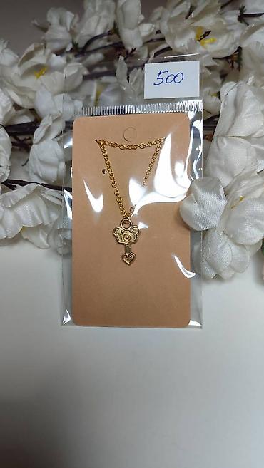 omega swatch replika: Zlatno-tonirani set ogrlice sa klasičnim lancem i privjeskom u obliku — 1