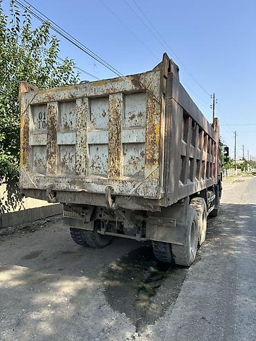 howo shacman: Самосвал HOWO (CNHTC), красный, 6x4 Описание: - Тяжёлый самосвал HOWO — 7