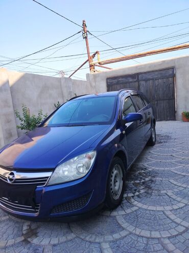 Opel: Opel Astra H Caravan (universal), göy rəng. - Kuzov: universal — 3