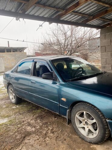 mazda tribut: Mazda 626: 1994 г., 1.8 л, Механика, Бензин, Седан