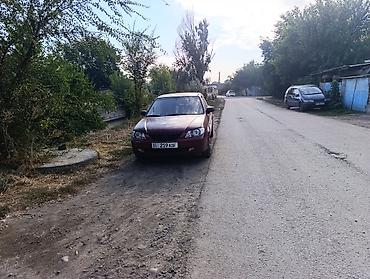 demio sport: Mazda 323: 2001 г., 1.8 л, Автомат, Бензин, Седан — 6