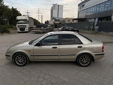 Mazda: Mazda 323: 1998 г., 1.5 л, Механика, Бензин, Седан — 4