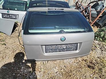 Kompletan auto u delovima: Delovi za Škoda vozila – originalni - Prednja osovina/vešanje: par — 9