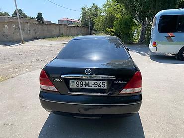 skoda rapid: Nissan Sunny: 1.3 l | 2009 il Sedan — 2