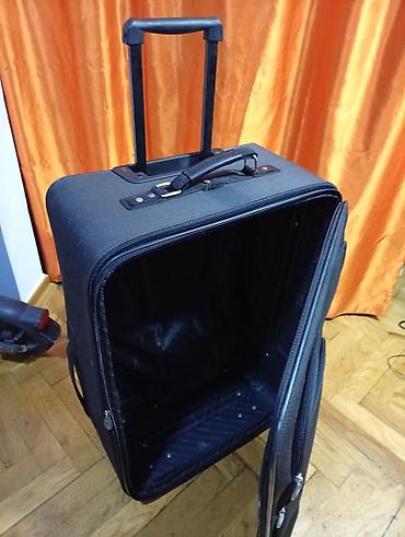 Putni koferi i torbe: Veliki kofer na točkiće sa teleskopskom ručkom. oko 75 50 30 — 6
