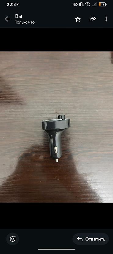 duymeli telefonlar: Avtomobil üçün Bluetooth FM transmiter və iki USB çıxışlı şarj cihazı — 1