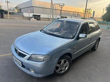 byd bot 384: Mazda 323: 2001 г., 1.6 л, Механика, Бензин, Универсал — 3