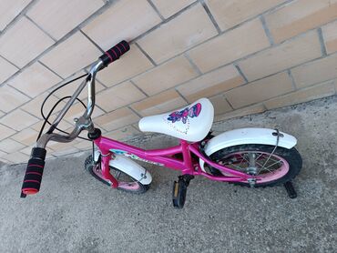 deciji biciklovi: Deciji bicikl Panda za devojcice 12" Decija bicikla Panda. Tockovi su