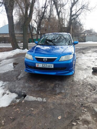 Mazda: Mazda 323: 2003 г., 1.6 л, Механика, Бензин