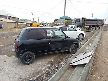 Daihatsu: Daihatsu Cuore: 2001 г., 1 л, Механика, Бензин, Купе — 3