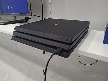 ps4 aksesuar: 4 pro ideal vəziyətdədir . Proşifkalı madeldir. yaddaşı 1 TB əlavə — 1