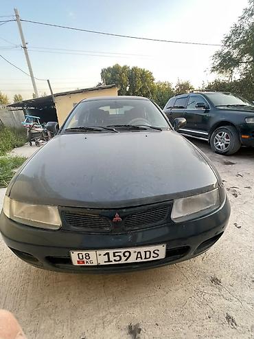 панель камри 35: Mitsubishi Carisma: 1997 г., 1.8 л, Автомат, Бензин, Седан — 1