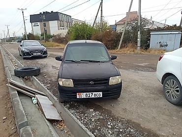 Daihatsu: Daihatsu Cuore: 2001 г., 1 л, Механика, Бензин, Купе — 4