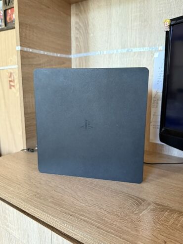 Mətbəx texnikası: PlayStation 4 Slim oyun konsolu - Rəng: Qara, yığcam “Slim” korpus -