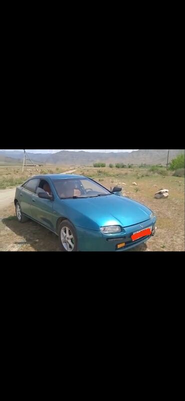 Транспорт: Mazda 323: 1.5 л | 1997 г. | Седан