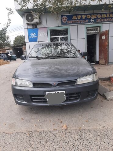 surətlər qutusu: Mitsubishi sedan her gun surulen masindir - Korpus: 4 qapılı sedan