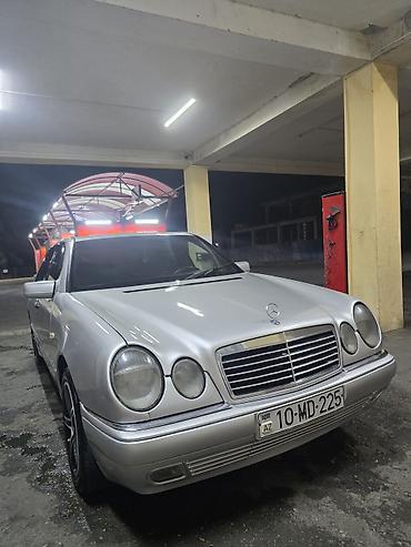 Mercedes-Benz: Mercedes-Benz E-Class: 2.4 l | 1999 il Sedan — 2