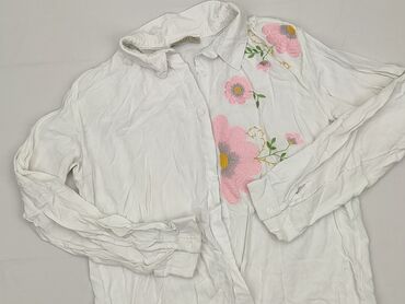 Women: Women`s shirt, size XL (EU 42)