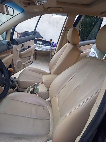 Kia: Kia Carens: 2 l | 2008 il — 18