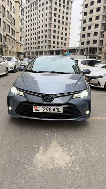 toyota axio: Toyota Corolla: 2021 г., 1.8 л, Вариатор, Гибрид, Седан — 1
