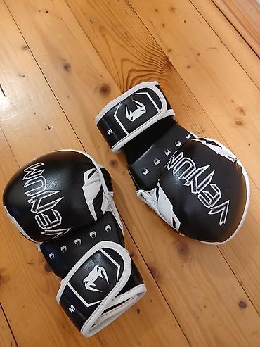 mma əlcəyi: Venum döyüş avadanlıqları dəsti Məzmun: - 1 cüt Venum shin guard – — 3