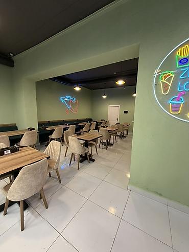 qara qaraev: Hazir Ailevi Restoran Biznesi satılır 65 mn Ayliq icarısi 3 mn mıkan — 4