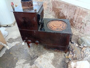 бак на атего: Твердотопливная печь-«буржуйка» с варочной поверхностью и водяным