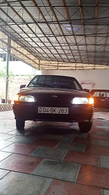 lada 2115: Lada Samara (VAZ 2115), tünd qəhvəyi rəng. Sedanikə bənzər 5 qapılı — 4