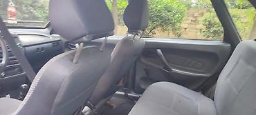 VAZ (LADA): Lada Samara – qara rəngli hetçbek Xüsusiyyətlər: - Kuzov: 5 qapılı — 4