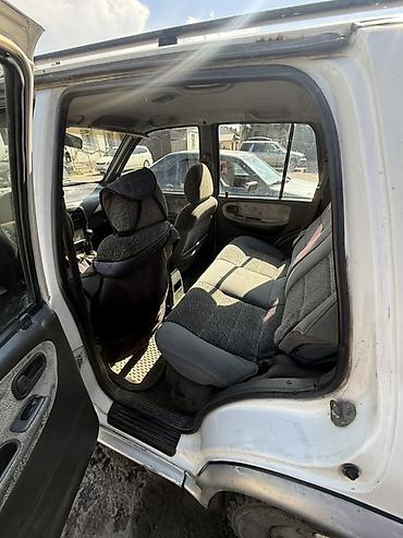 танден: Kia Sportage: 1995 г., 2 л, Механика, Дизель, Внедорожник — 7